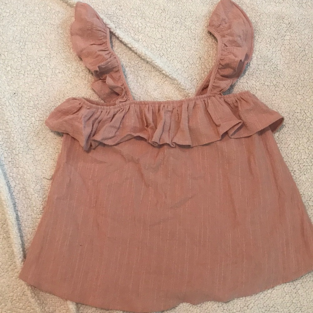 Blush, ruffled tank.
